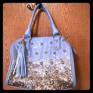 Flashy bowling bag style purse.